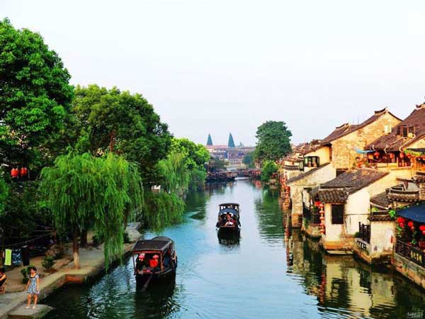 华东五市“乌镇.南浔.木渎”、海口.兴隆.三亚四飞11日游